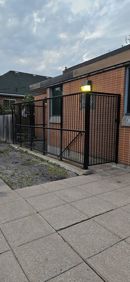 Side Shot of Welded Metal Basement Security Entry Gate.