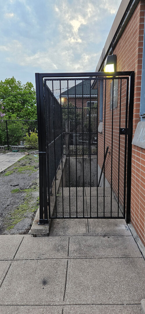 Front Shot of Welded Metal Basement Security Entry Gate.